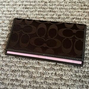 Brown coach check book